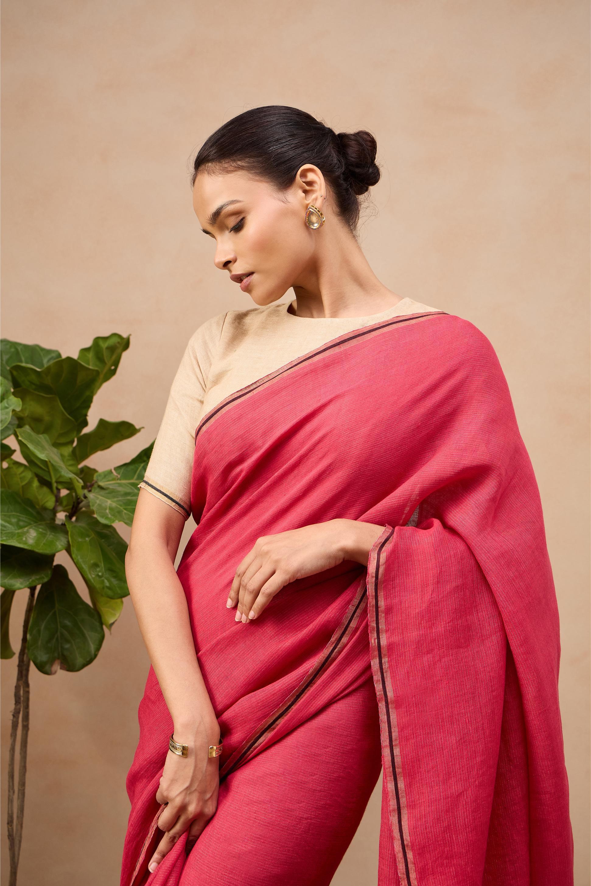 Linen Zari sarees - saree close-up showcasing intricate handloom texture